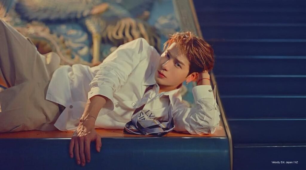 Jackson Wang on Esquire Hong Kong February 2026 double cover, styled in sleek menswear with cinematic Hong Kong lighting.