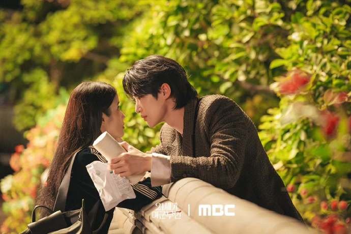 IU and Byun Woo Seok Drum Up Chemistry in New Couple Drama Stills From Perfect Crown