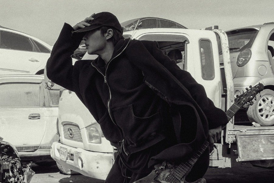 WOODZ Desperately Flees With A Cursed Guitar In New Poster For Mystery Short Film “Slide Strum Mute”