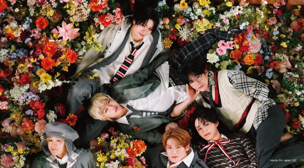 DXTEEN “Heart Beat” 2nd Album – Floral Schoolboy Concepts DXTEEN members lying in a field of colorful flowers in school-inspired fashion for “Heart Beat” album cover.