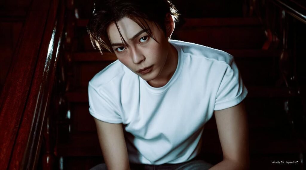 Sung Hanbin of ZEROBASEONE in a moody, monochrome compcard shoot titled “Beyond The Shell,” 2026.