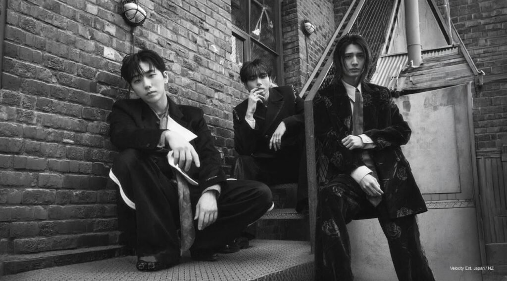 Xdinary Heroes Kitto Magazine Japan April 2026 Digital Cover Xdinary Heroes on Kitto Magazine Japan April 2026 digital cover, six-member K-band striking sharply styled rock looks in a dark, cinematic studio.