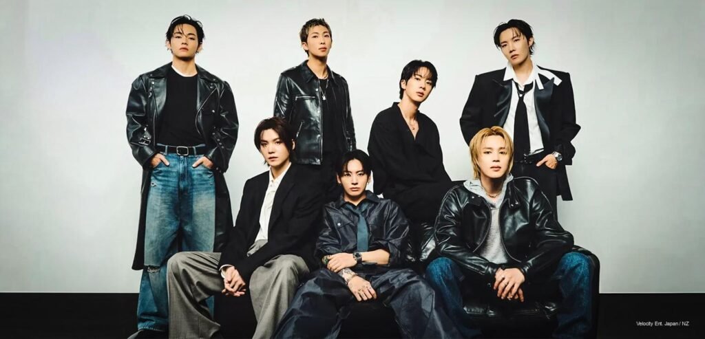 Dressed in Heritage: How BTS’s Fashion Language Is Rewriting Global Style in 2026 – Kpoppie BTS members in editorial fashion looks for Rolling Stone May 2026, wearing Rick Owens, Maison Margiela, Dior, and John Lawrence Sullivan against a minimal backdrop