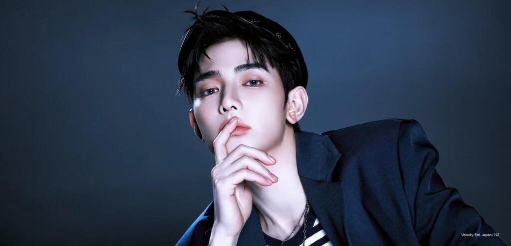 AND2BLE member in black leather jacket and chain necklace — Sequence 01: Curiosity, Gazed Version individual concept photo by YH Entertainment, May 2026