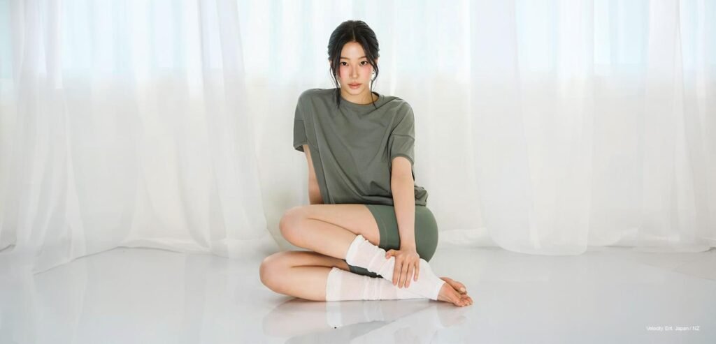 Kazuha in lululemon, mid-turn in a sunlit studio, fabric and light shaping her silhouette.