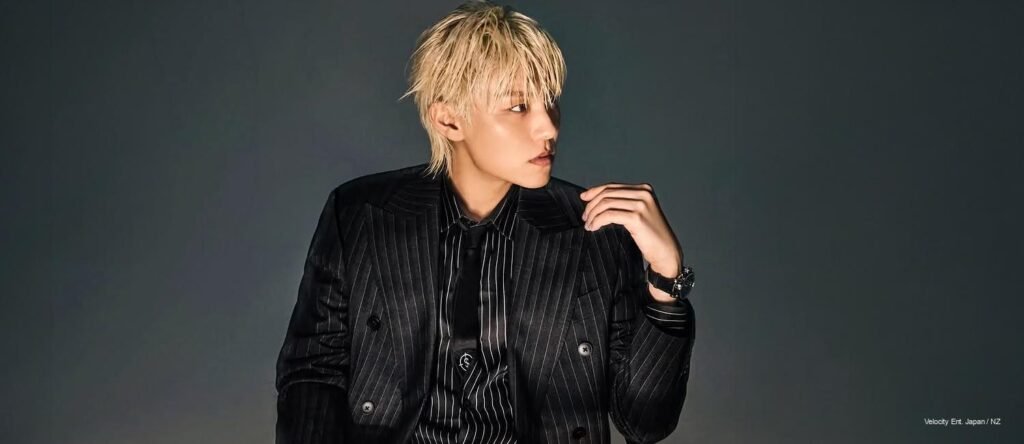 Wanna One nine members in black and white suits for ELLE Korea June 2026 digital cover
