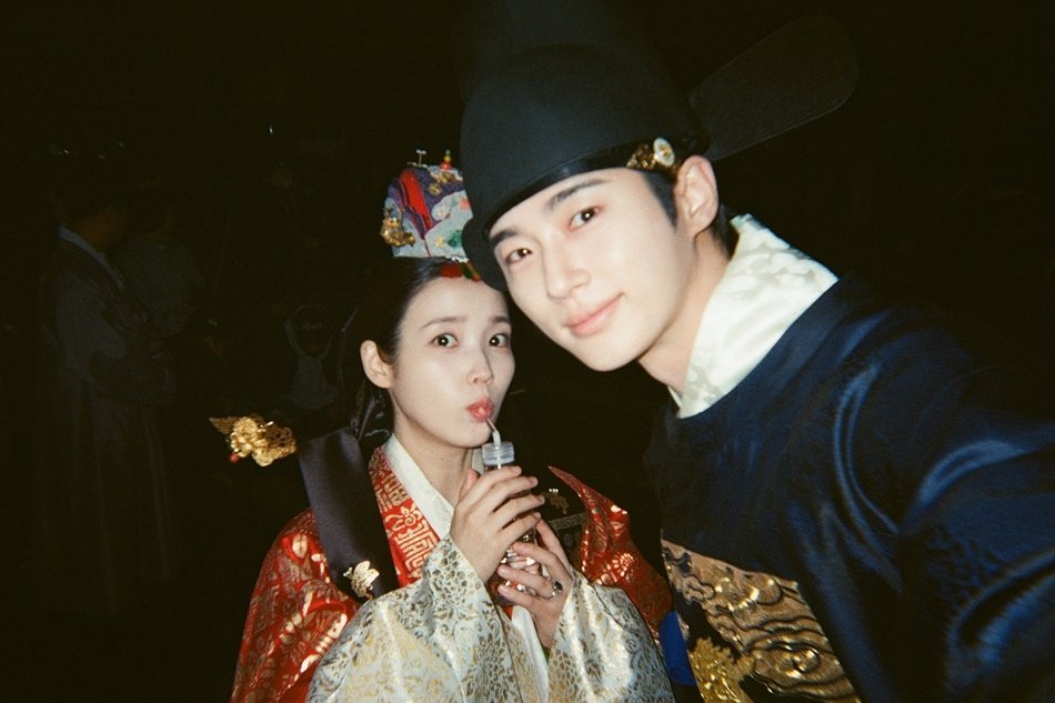 Watch: "Perfect Crown" Reveals Photos IU And Byeon Woo Seok Took Of Each Other Behind The Scenes