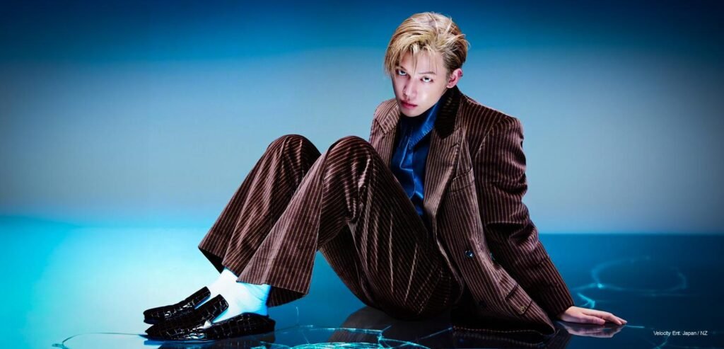 Yeonjun of TXT posing for Harper's BAZAAR Men China May 2026 cover shoot in luxury fashion editorial