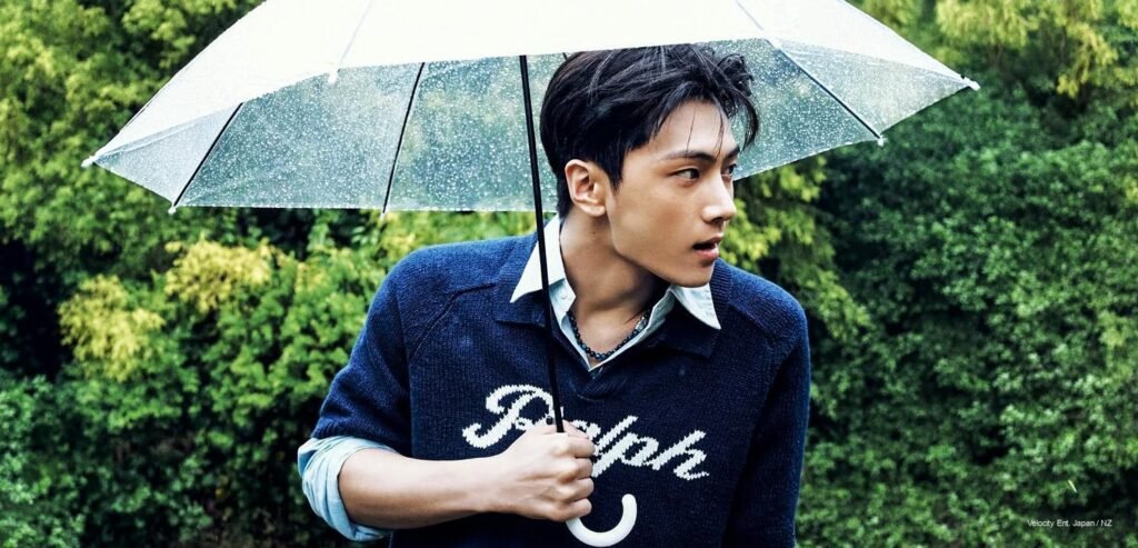 Jay of ENHYPEN in navy Polo Ralph Lauren tailored blazer on the cover of Vogue Korea June 2026 digital issue