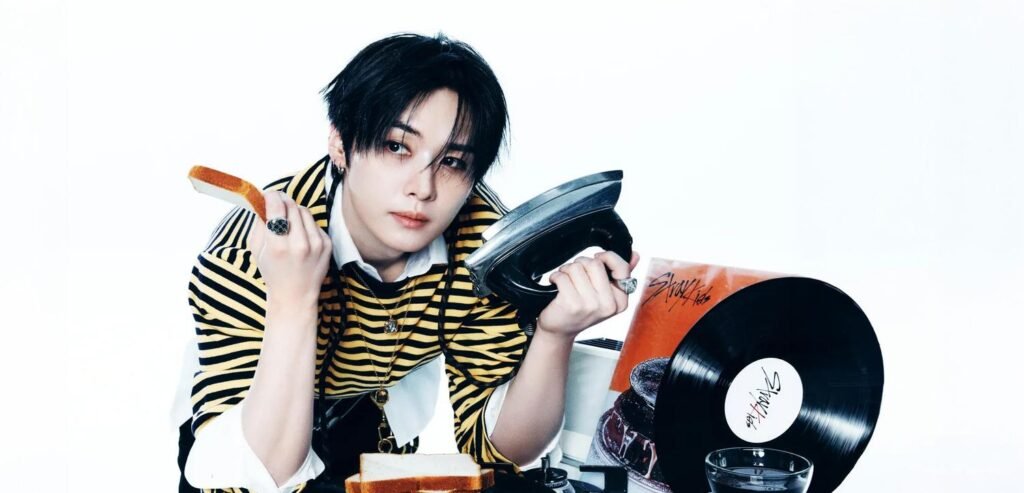 Stray Kids bring wit, polish, and surreal charm to the THIS & THAT concept photos – Kpoppie Stray Kids concept photo for THIS & THAT featuring a playful coffee-themed editorial setup with Lee Know, Hyunjin, and Felix.