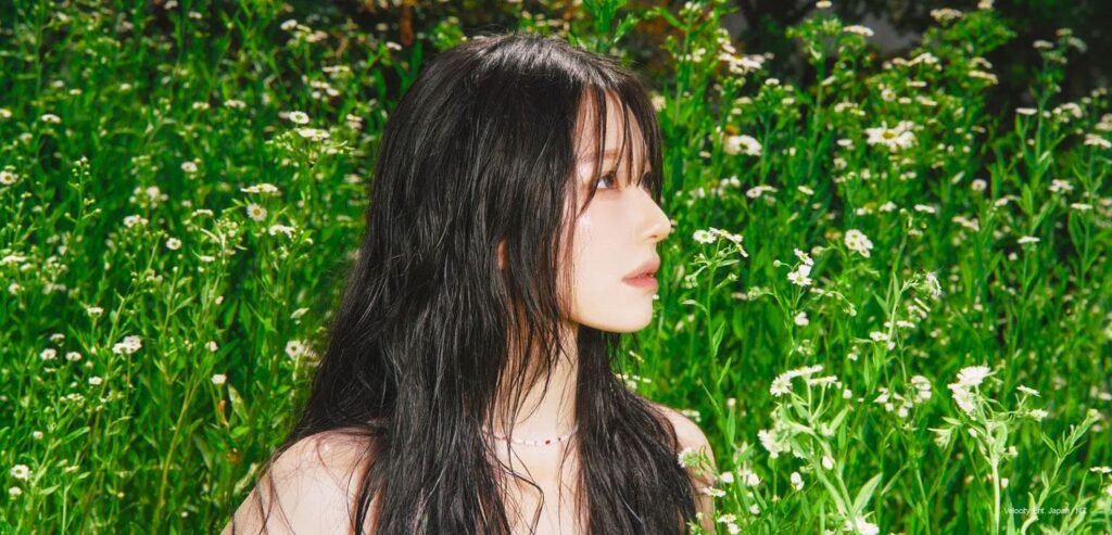 fromis_9 Ripens: Inside the Fruit Ver. of Glow ME – Kpoppie fromis_9 member in cherry-red concept diptych for Glow ME Fruit Ver., cherry held to lips paired with macro shot of vine tomatoes, sunlit outdoor styling.