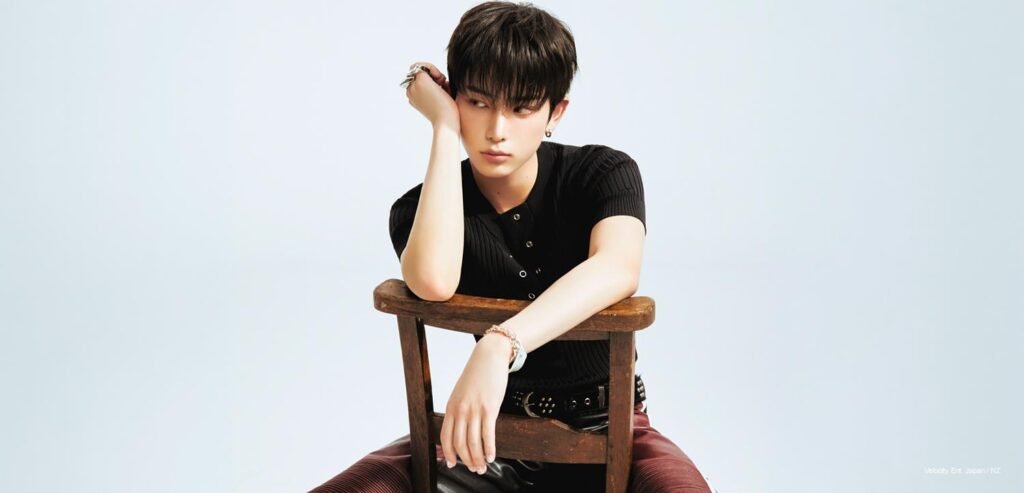 &TEAM member in black ribbed polo and burgundy trousers for 'Mark on Me' Tame Me Ver. individual concept photo