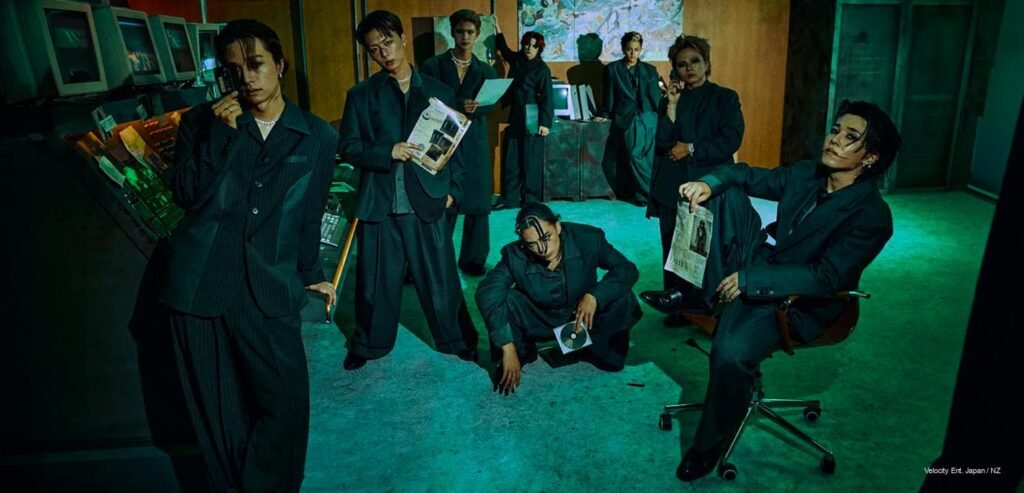 ONE OR EIGHT – EN-GÏNE Teaser Concepts – Members of Japanese boy group ONE OR EIGHT posing in tailored grey suits inside a dark green industrial control room for their EN-GÏNE EP teaser.